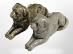 A pair of Vietnamese or Thai Celadon glazed figures of recumbent newfoundland dogs, length 14cm.