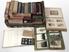 A group of antiquarian volumes including several leather-bound Bibles,