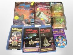 A group of Playmates Star Trek models and related collectibles, all boxed.