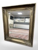 An antique gilded mirror, 81cm x 94cm.