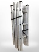 A folding aluminium extension ladder.