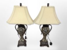 A pair of contemporary gilt table lamps with shades,