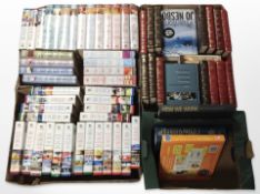 A collection of Reader's Digest and other volumes.