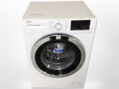 A Beko 8kg washing machine.