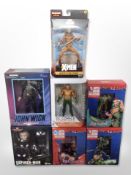 A group of Hasbro, DC Collectibles and other figures, including Spider-Man, Aquaman, John Wick, etc.