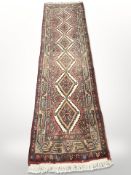 A North West Iranian runner, 300cm x 80cm.