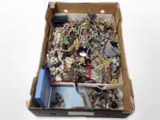 A large quantity of mixed costume jewellery, bead necklaces, bangles, etc.