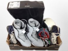 A pair of snowboarding boots, size 8.