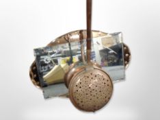 An Art Deco two-tone unframed mirror,