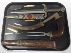 A group of fantasy knives, pocket knives, etc.