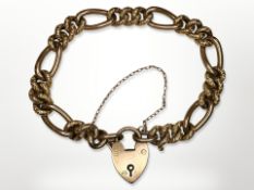 An antique 9ct gold padlock bracelet with ornate engraved links CONDITION REPORT: