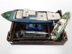 A remote-controlled boat, length 70cm, together with one other model boat, diecast classic car, etc.