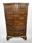 A reproduction mahogany six drawer tall boy,