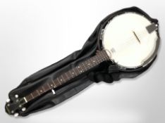 A Tanglewood five string banjo in soft carry case