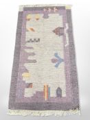 An eastern kilim on lilac ground,