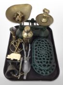A set of enamelled and brass scales with weights, painted trivets, wall bell, brass keys, etc.