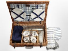 An Optima wicker picnic hamper and contents.