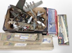 A group of vintage scale aircraft modelling kits including Revell and several model aircraft.