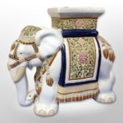 A glazed ceramic elephant plant stand, height 42cm.