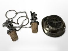 A pair of silver plated bottle stoppers modelled as fairies together with a Culinary Concepts 'Top