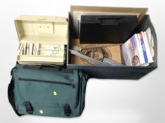 A group of painting supplies including folding easels, artist's box containing paints, etc.