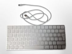 An Apple keyboard model A1644, with lead.