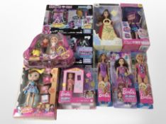 A group of Mattel Barbie dolls and similar toys, boxed.