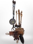 A group of oriental and African hardwood carvings, a copper-plated companion set on stand,