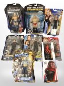 Eight Mattel and other Wrestling figurines, boxed.