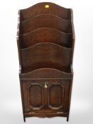 An Edwardian oak magazine stand,