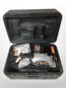 An Evolution 185mm multipurpose circular saw, in case, with instructions.