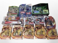 A group of Mattel and other figures including Superman, Indiana Jones, Green Lantern, etc.