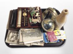 A group of antiquarian postcards, cutthroat razors, hydrometer in fitted case,