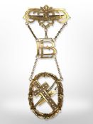 A 9ct yellow gold presentation brooch in three suspended sections mounted to a bar, 'Bethabara No.