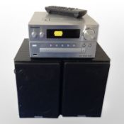 A Panasonic DAB USB Hi-Fi, with remote, together with a pair of speakers.