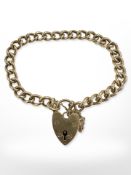 A 9ct yellow gold bracelet with heart clasp, 17 cm long approximately.