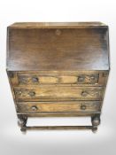 A 1920's oak bureau,