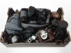Vintage cameras including Pentax and Agfa, various lenses and camera bags.