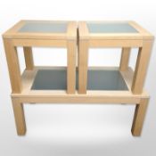 A contemporary oak veneered glass topped rectangular table 120 cm long x 60 cm wide x 48 cm high