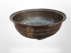 A 19th century engraved copper bowl,