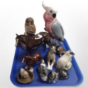 A Beswick brown gloss figure of a stallion, Beswick figure of a Parakeet,