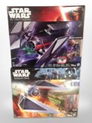 Two Hasbro Disney Star Wars figures, First Order Special Forces Tie Fighter and Tie Striker, boxed.