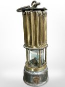 A 19th-century brass and steel The Premier Lamp and Engineering Company Limited miner's lamp.