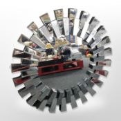 A contemporary glass sunburst mirror,