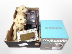 Two resin figures of dogs, a vintage-style Roberts radio,