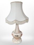 A contemporary pottery lamp base with shade,