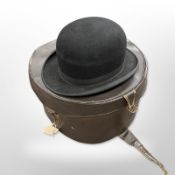 A gentleman's bowler hat by Norman Brooks Limited of Clayton Street, Newcastle on Tyne, size 7,