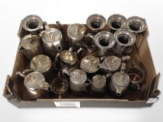 A quantity of silver-plated trumpet vases, teapots.