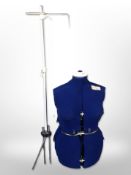 An adjustable dressmaker's mannequin.