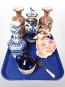 An early 20th century Chinese blue and white crackle glaze lidded vase,